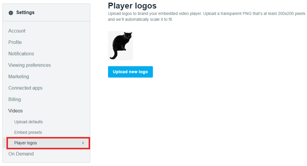 The Account Settings page. Player logos is selected under the Videos header in the panel on the left side. To the right, under the header 'Player logos', there is an example of a logo (an illustration of a black cat). Under the logo is a button labeled 'Upload new logo'.