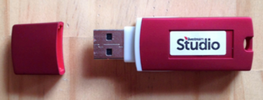 a photo of the red USB dongle with the livestream studio logo on it.